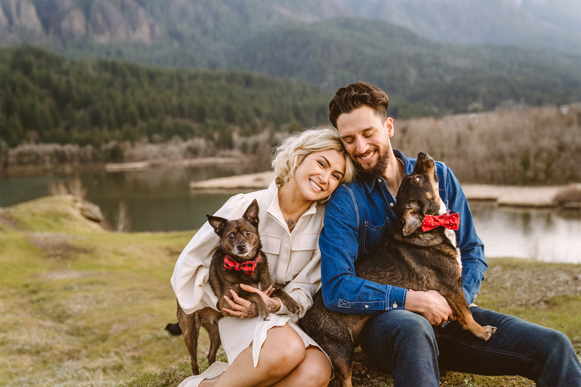A couple at their engagement session in the Columbia Gorge with their dogs